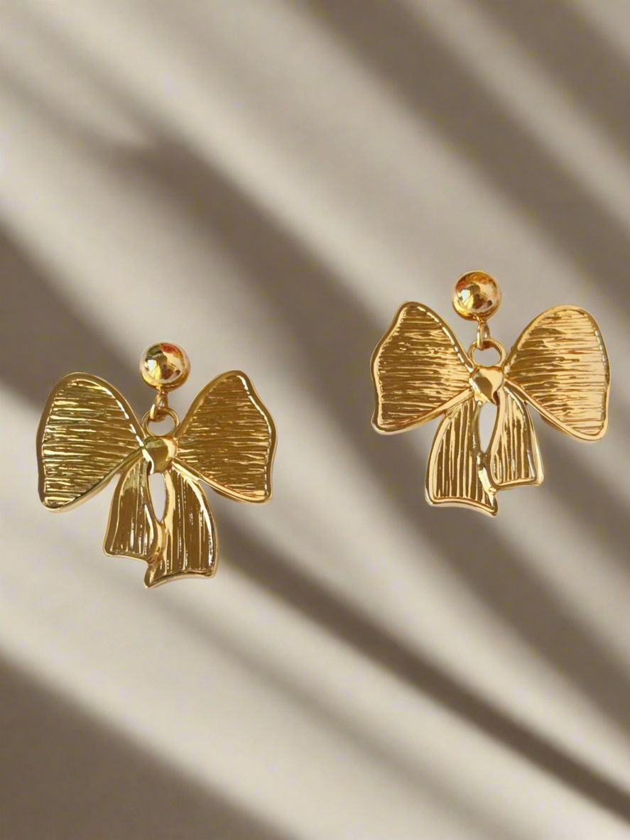 NOYA - Orecchini Fiocco Oro